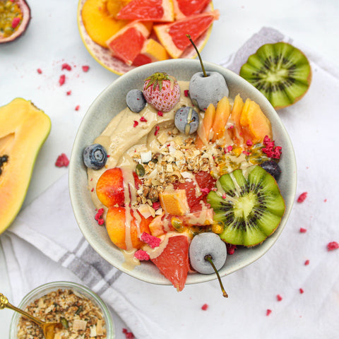 tropical fruit protein smoothie breakfast bowl